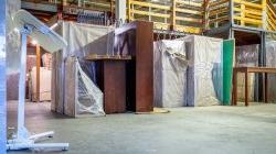 Photo of surplus furniture in storage area.