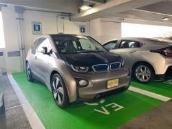 Photo of cars using the electric vehicle (EV) charging stations in the Red Hawk Parking Deck