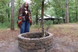 Photo of Tyrese Gould Jacinto infront of fire pit on Cohanzick Nature Preserve